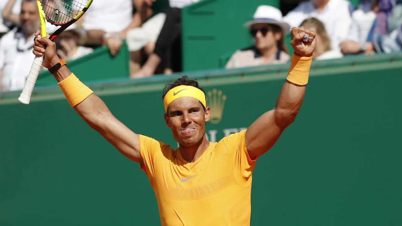 Tennis player celebrating a winning point